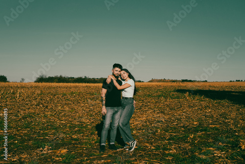 couple in love in a sunset in the field © Eric