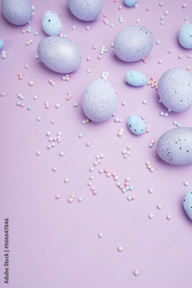 Bunch of colorful eggs with dots on purple background. Minimal Easter concept with copy space for text. Bunch of colorful eggs with dots on purple background. Minimal Easter concept with copy space for text.