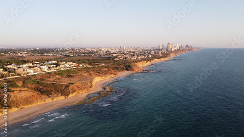 Summer sunset views of the Mediterranean sea. Clear blue sky with aerial capture