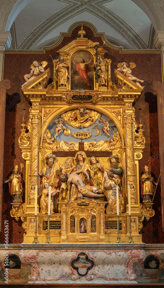 LUZERN, SWITZERLAND - JUNY 24, 2022: The carved polychrome side altar with the Pieta (Deposition) in the church St. Leodegar im Hof by Niklaus Geisler (1585-1665)