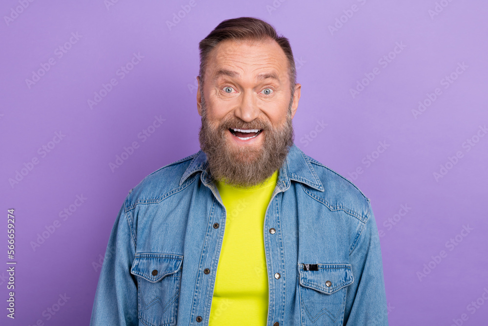 Photo of astonished positive person toothy smile cant believe isolated on violet color background Photo of astonished positive person toothy smile cant believe isolated on violet color background