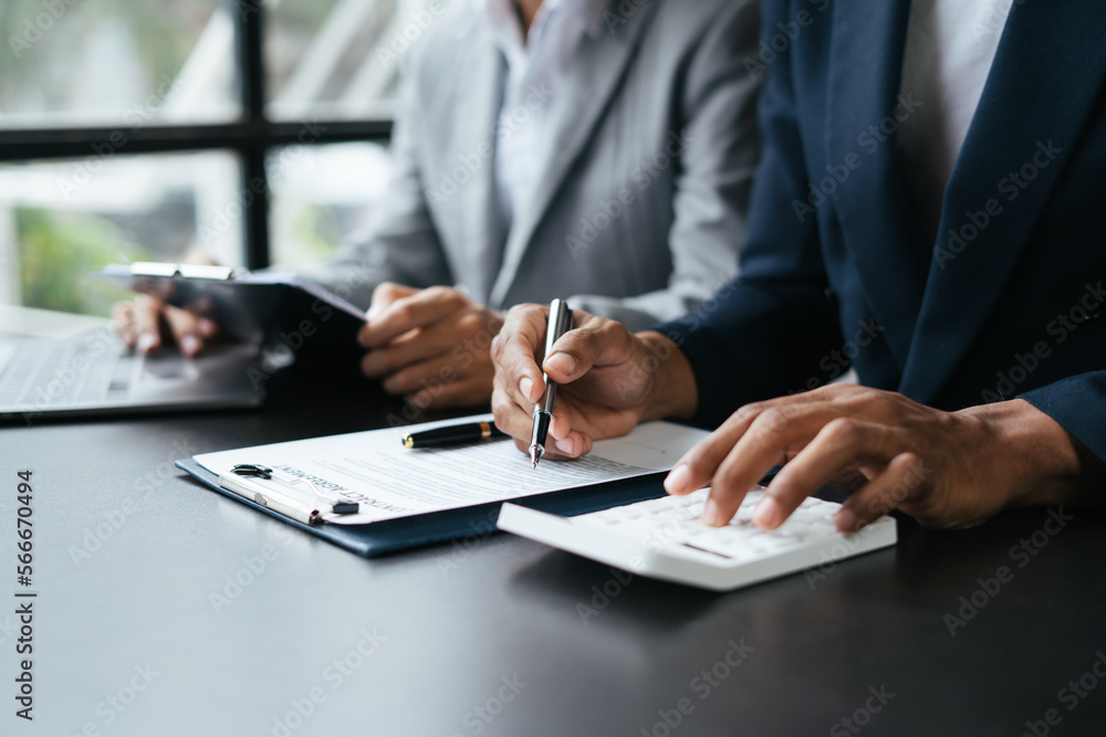 Discussion with a real estate agent. Real estate agent having a discussion with his client about purchasing house. Discussion with a real estate agent. Real estate agent having a discussion with his client about purchasing house.
