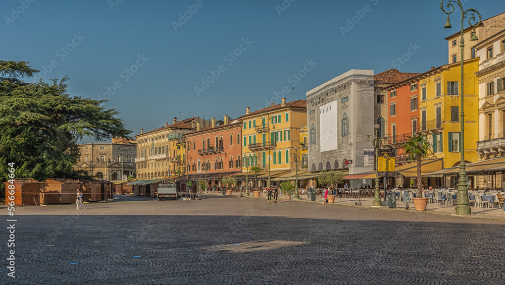 historic centre of Verona city: Restaurants and tourists in front of the Arena, Piazza Bra, Verona, Veneto, northern Italy - September 9, 2021