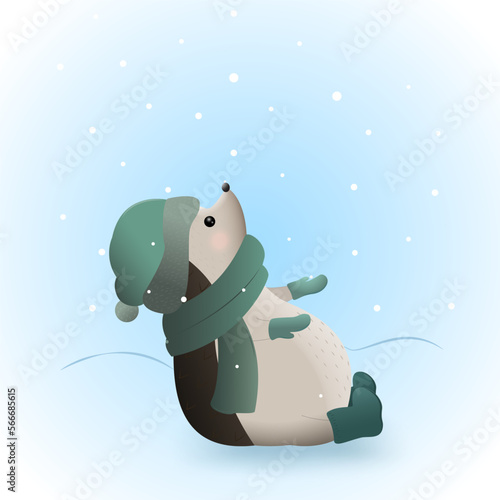 Little hedgehog catching snowflakes in the snowdrift