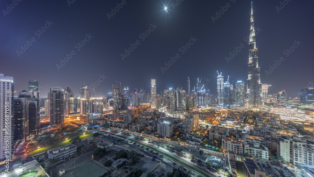 Dubai Downtown all night with tallest skyscraper and other towers