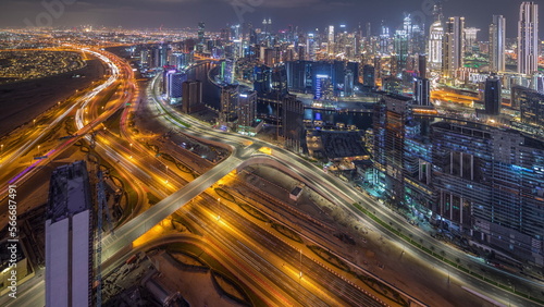 Panorama showing skyline of Dubai with business bay and downtown district night . photo