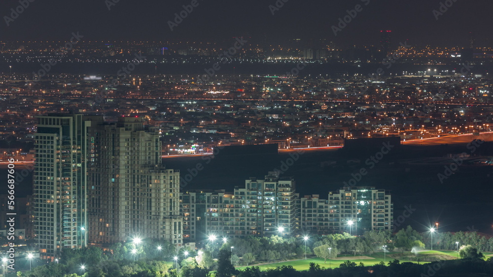 Aerial view of greens district area night from Dubai marina. Aerial view of greens district area night from Dubai marina.