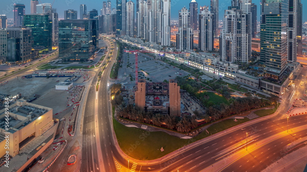 Bay Avenue with modern towers residential development in Business Bay aerial panoramic night to day , Dubai Bay Avenue with modern towers residential development in Business Bay aerial panoramic night to day , Dubai