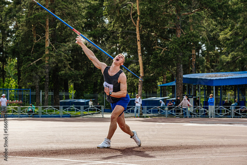 javelin throwing in competition male athlete