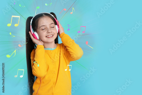 Cute girl listening to music through headphones on light blue background, space for text. Music notes illustrations