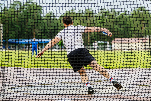 male athlete attempt in discus throwing