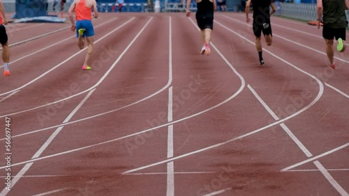 back athletes runners run sprint race at stadium