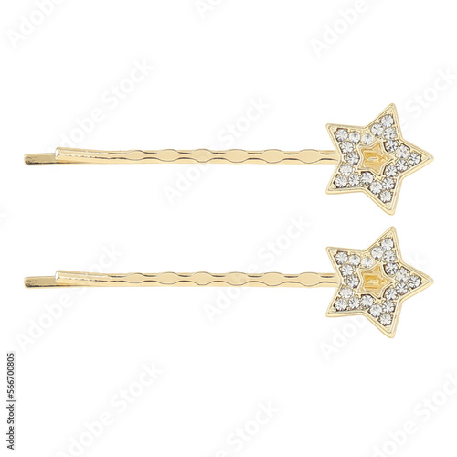 Golden hair clips in the shape of a star on a white background
