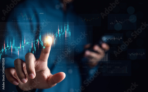 Business planning and strategy concept. Stock market, Business growth, progress or success. Businessman use smartphone for trader is showing a growing virtual hologram stock, invest in trading...