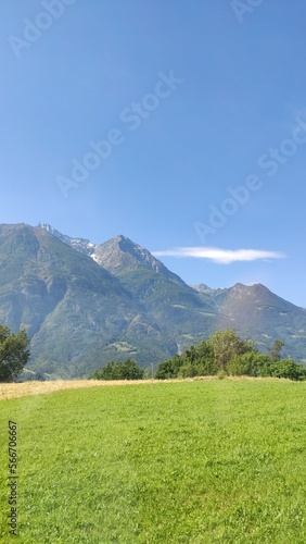 Valle d'Aosta green landscape with mountains in the Alps in Italy