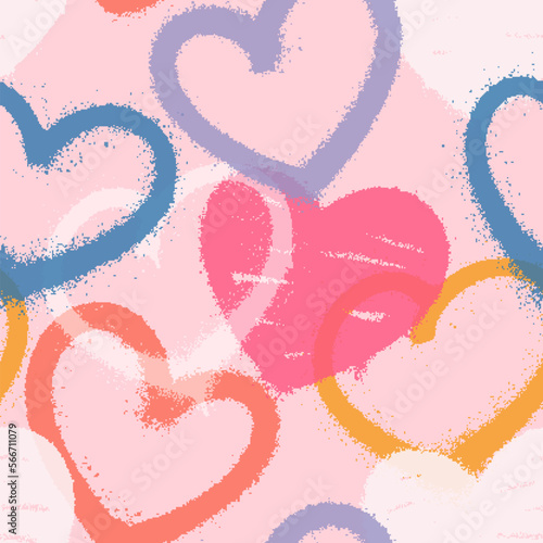 Seamless pattern of sprayed graffiti hearts. Vector illustration for your design