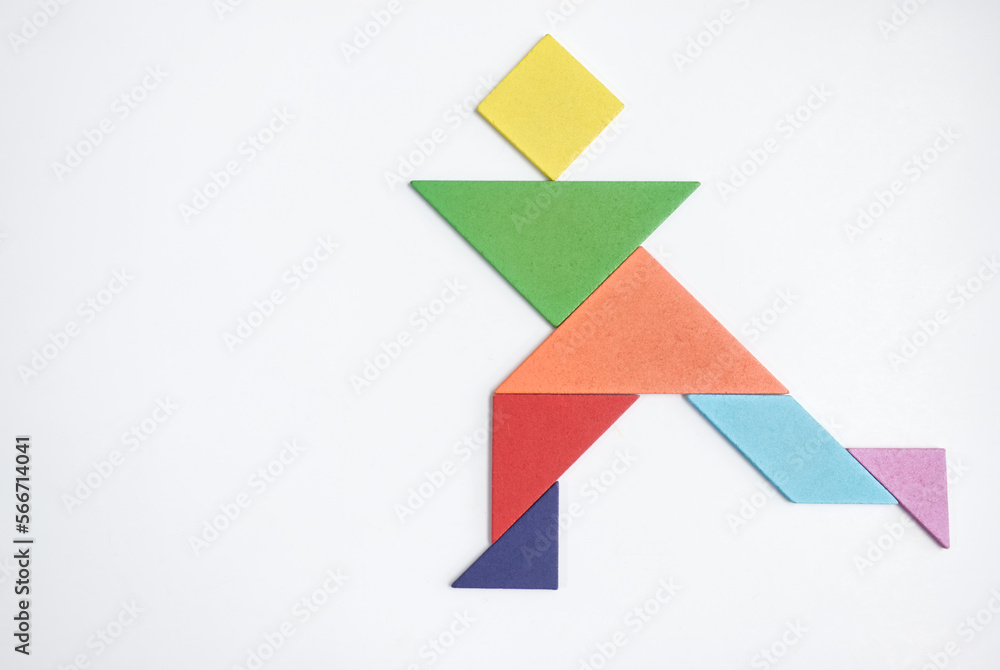 color tangram puzzle in running man shape on white background color tangram puzzle in running man shape on white background