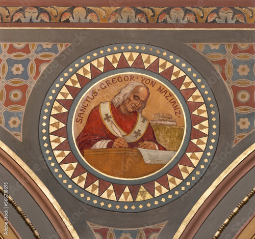 BERN, SWITZERLAND - JUNY 27, 2022: The fresco of St. Gregory of Nazianzus in the church Dreifaltigkeitskirche by August Müller (1923). photo