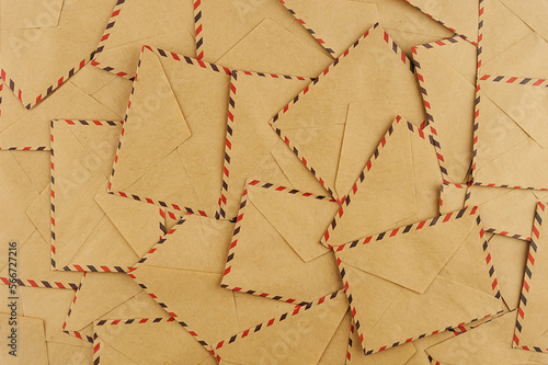 Background from a large number of postal envelopes, top view