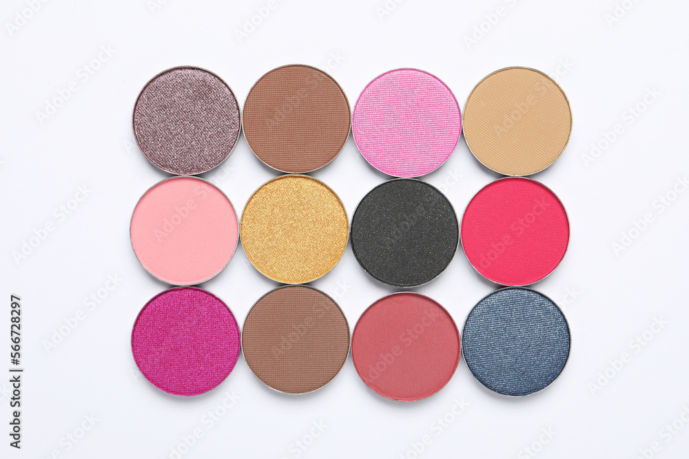Beautiful eye shadow refill pans on white background, flat lay Beautiful eye shadow refill pans on white background, flat lay
