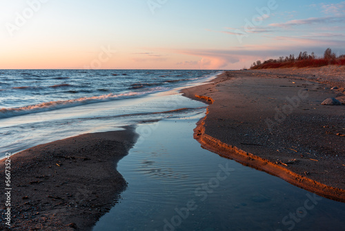 Fototapeta Naklejka Na Ścianę i Meble -  Rocky beach of the Baltic Sea at sunset