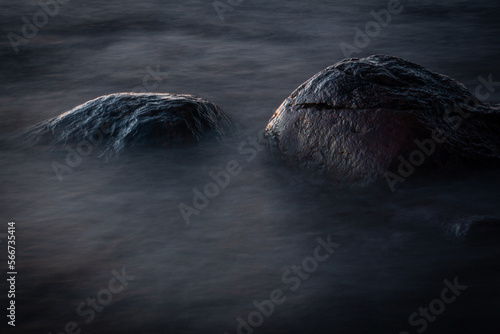 Fototapeta Naklejka Na Ścianę i Meble -  Rocky beach of the Baltic Sea at sunset