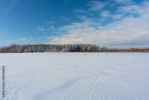 sunny, snowy winter day in the countryside