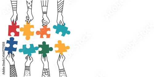 People hold in hands and connect the pieces of jigsaw puzzle.