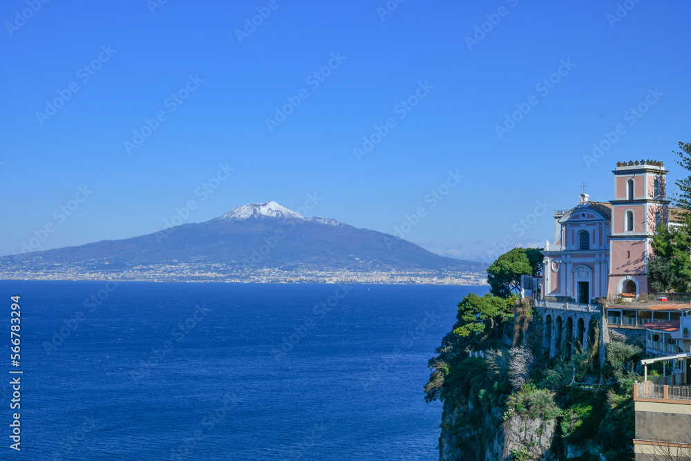 The Vesuvius volcano stands out over the gulf of Naples. Landscape from the town of Vico Equense.