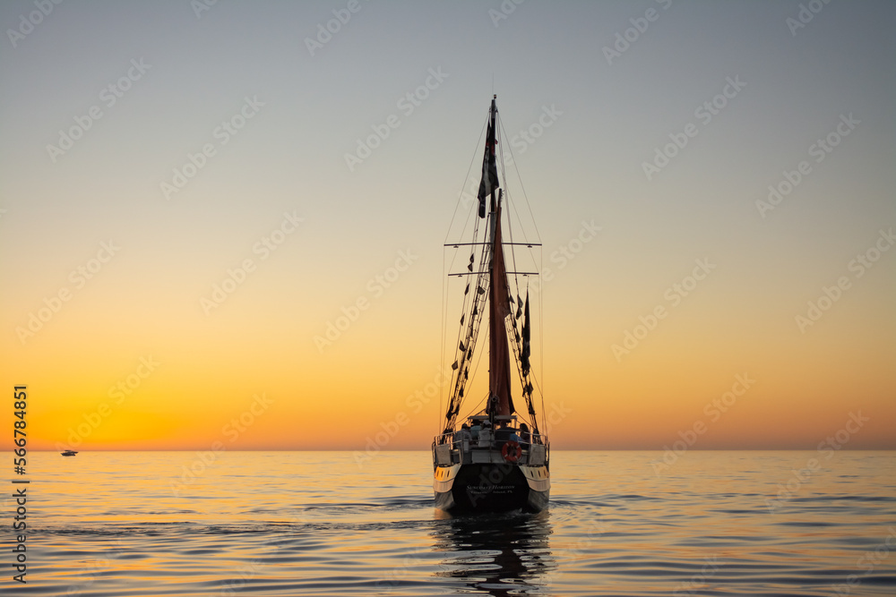 sailing yacht in the gulf of Mexico at sunset 