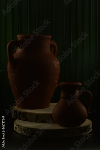 clay pot on black
