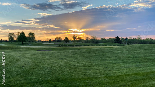 sunset over golf course