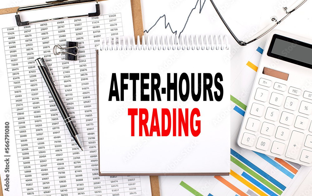 After-Hours Trading text on notebook with chart, calculator and pen After-Hours Trading text on notebook with chart, calculator and pen