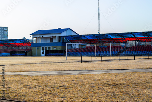 city small football stadium. organization of public space. Public amphitheater, empty seats in Smorgon, Belarus photo