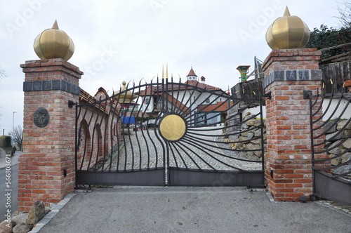 German-style villa in Obernberg am Inn, Germany December 2022. Metal gate to the private house. photo