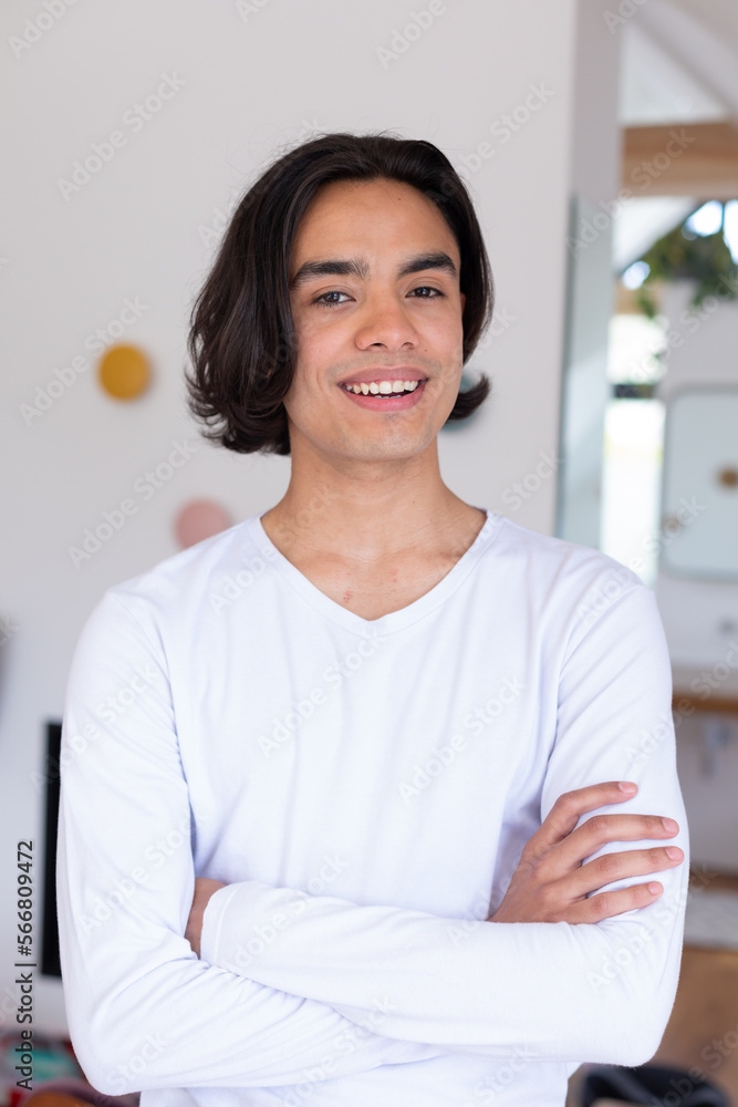 Portrait of happy biracial man looking at camera and smiling Portrait of happy biracial man looking at camera and smiling