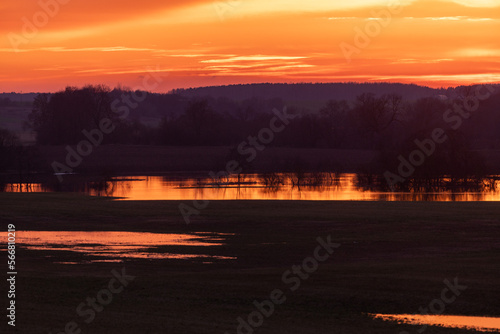 Reflections of the evening sky in the water photo