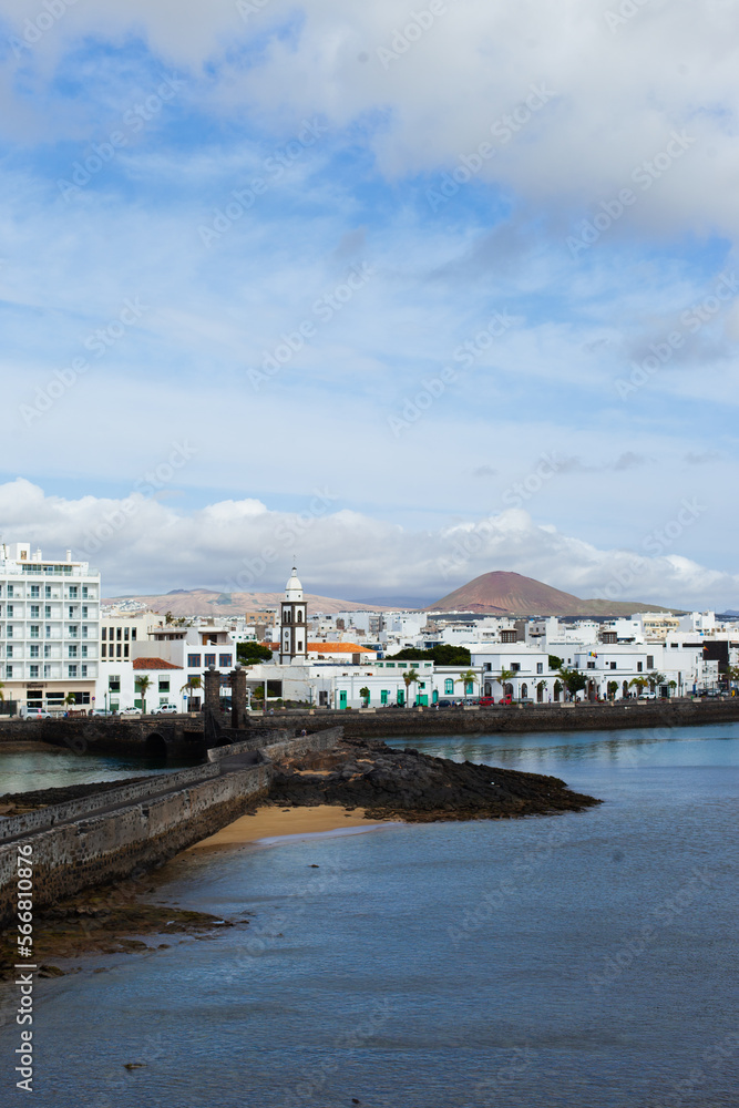 Arrecife port city view - capital of Lanzarote, Canary Islands. Cityscape of Arrecife on sunny day horizontal landscape background.