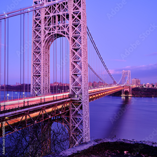 Light Trails from streaming rush hour traffic across the George Washington Bridge connecting North New Jersey to upper Manhattan at dusk © Jorge Moro