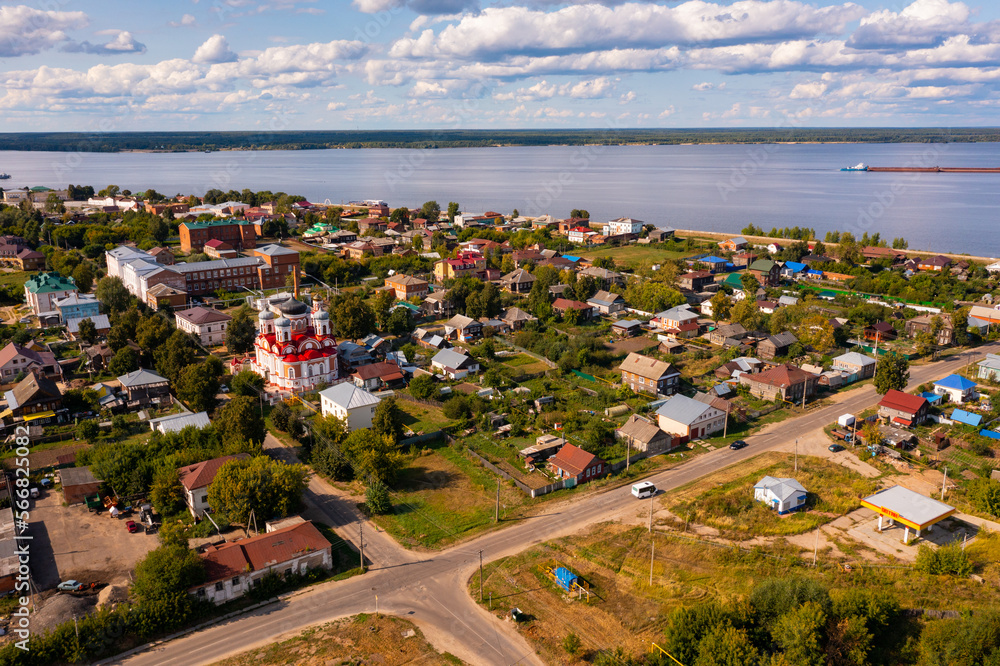 Summer view from drone of small Russian town of Kozmodemyansk in Mari El Republic on banks of Volga river 