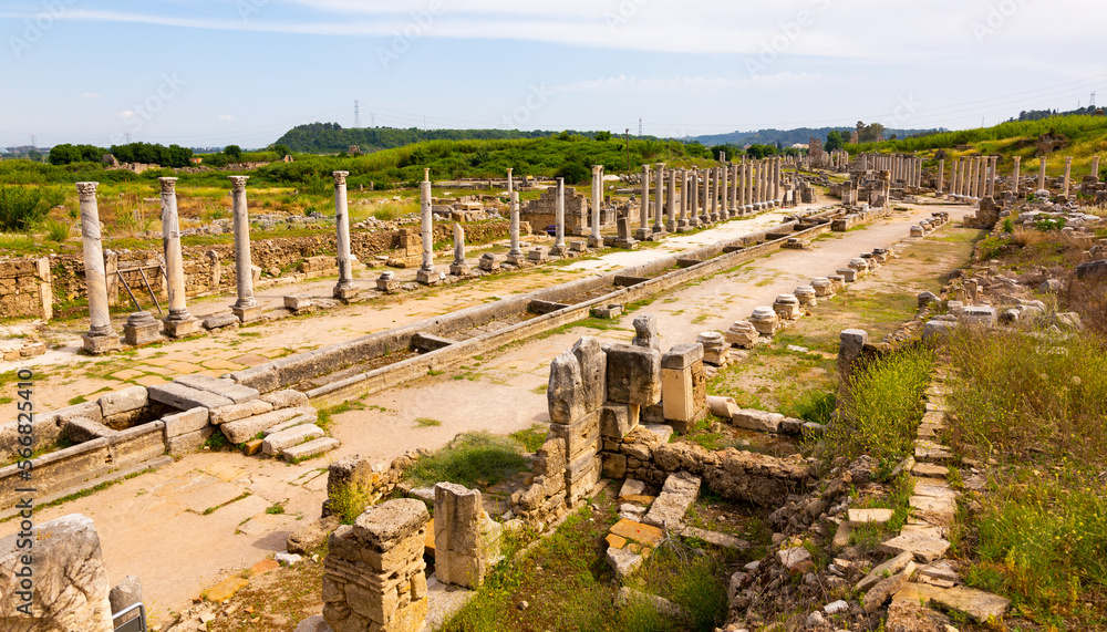 Streets of the ancient city of Perge with marble columns and antique statues, Turkey