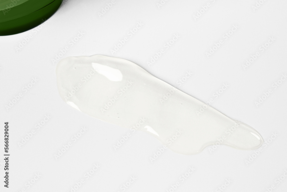 Aloe gel on a light background and a bottle of green. Aloe gel on a light background and a bottle of green.