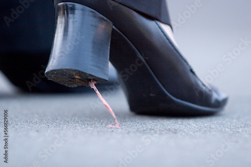 Gum stuck on high heel shoes. photo