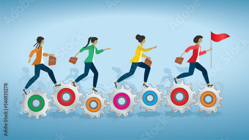 Business people women or students running on gear wheels or cog wheels. Dimension 16:9.
