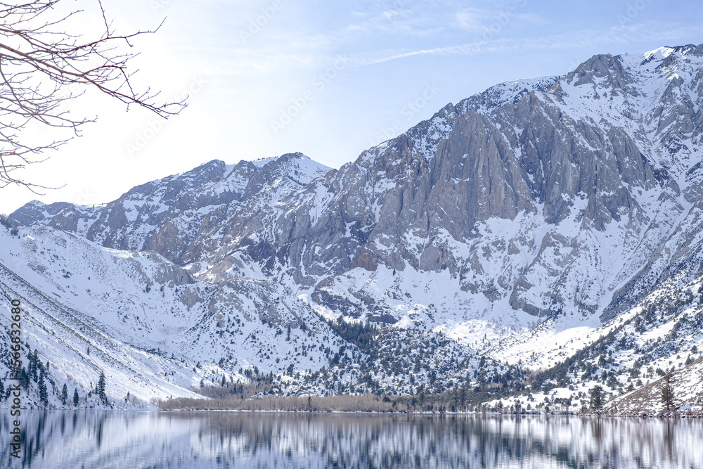 Convict lake cover snow, and a beautiful Alpine with blue sky. Beautiful nature, landscaped, and beauty in nature concept. Convict lake cover snow, and a beautiful Alpine with blue sky. Beautiful nature, landscaped, and beauty in nature concept.
