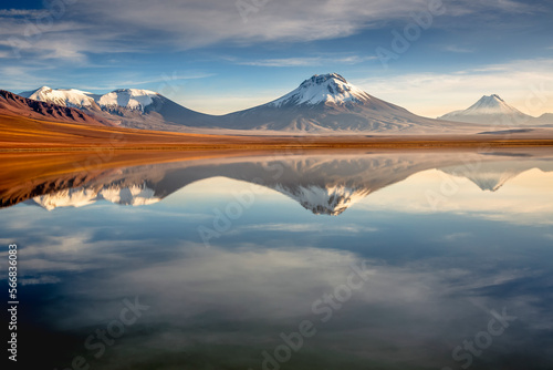 Salt lake Lejia reflection  idyllic volcanic landscape at Sunset  Atacama  Chile