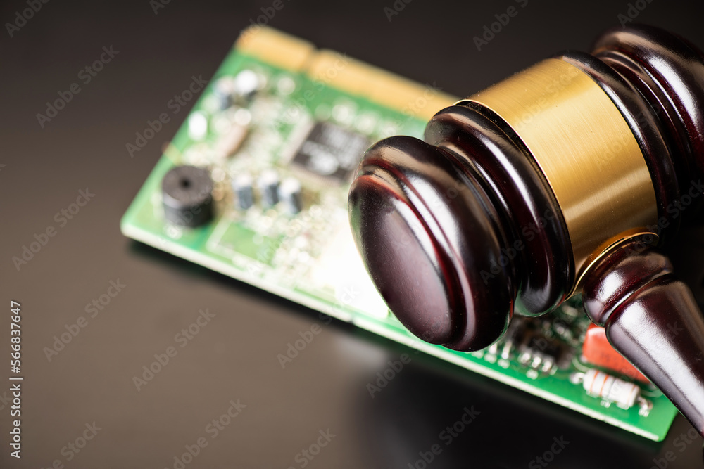 Hammer judge and blur the central processing unit or microchip on black ceramic background. Hammer judge and blur the central processing unit or microchip on black ceramic background.