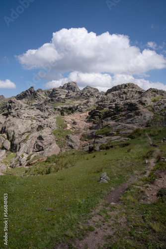 Hiking in the rock massif Los Gigantes in Cordoba, Argentina. View of the trail and rocky hill in a sunny day. 