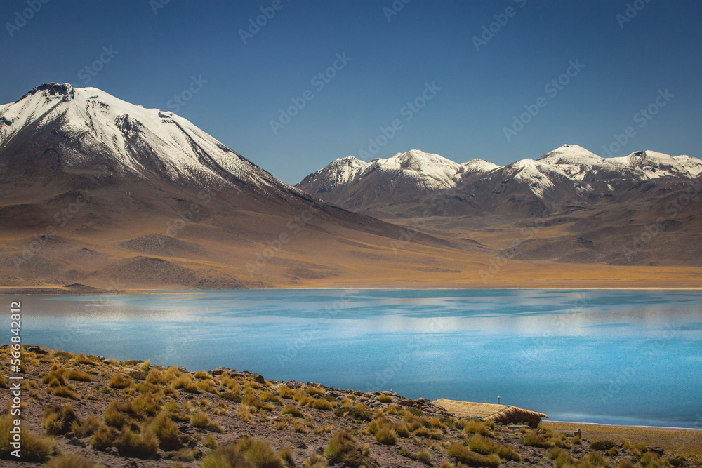 Salt lake, turquoise Laguna Miscanti, volcanic landscape at sunrise, Atacama