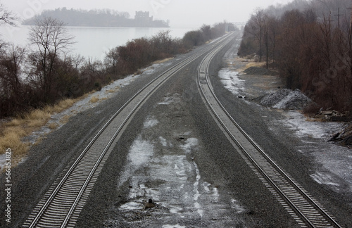 railway in winter Railroad tracks paralleling the Hudson River, Cold Spring, New York 